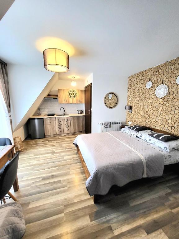 Postel nebo postele na pokoji v ubytování Wierchowianka