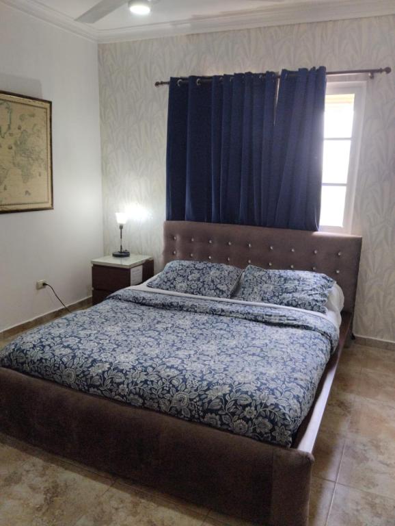 Postel nebo postele na pokoji v ubytování Nely y Pietro share apartment