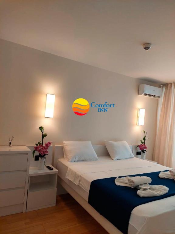 Postel nebo postele na pokoji v ubytování Comfort Inn ☆ Orbi City