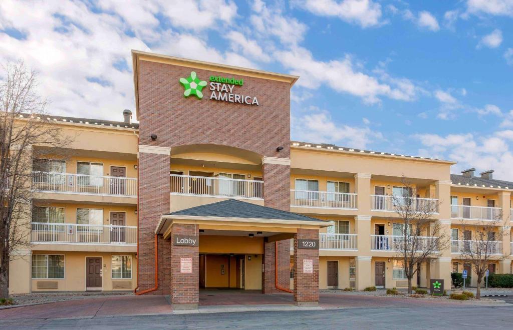 a large building with a star american sign on it at Extended Stay America Suites - Salt Lake City - Sugar House in Salt Lake City