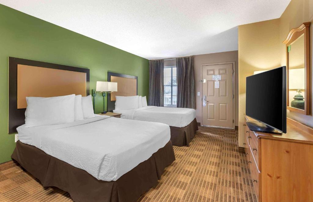 Postel nebo postele na pokoji v ubytování Extended Stay America Select Suites - Phoenix - Mesa - West