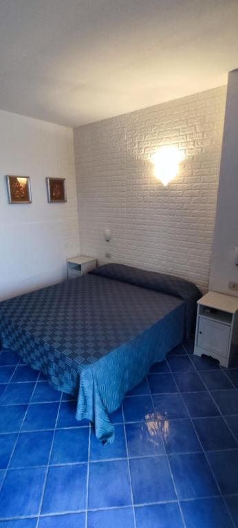 Postel nebo postele na pokoji v ubytování Bed & Breakfast Laino