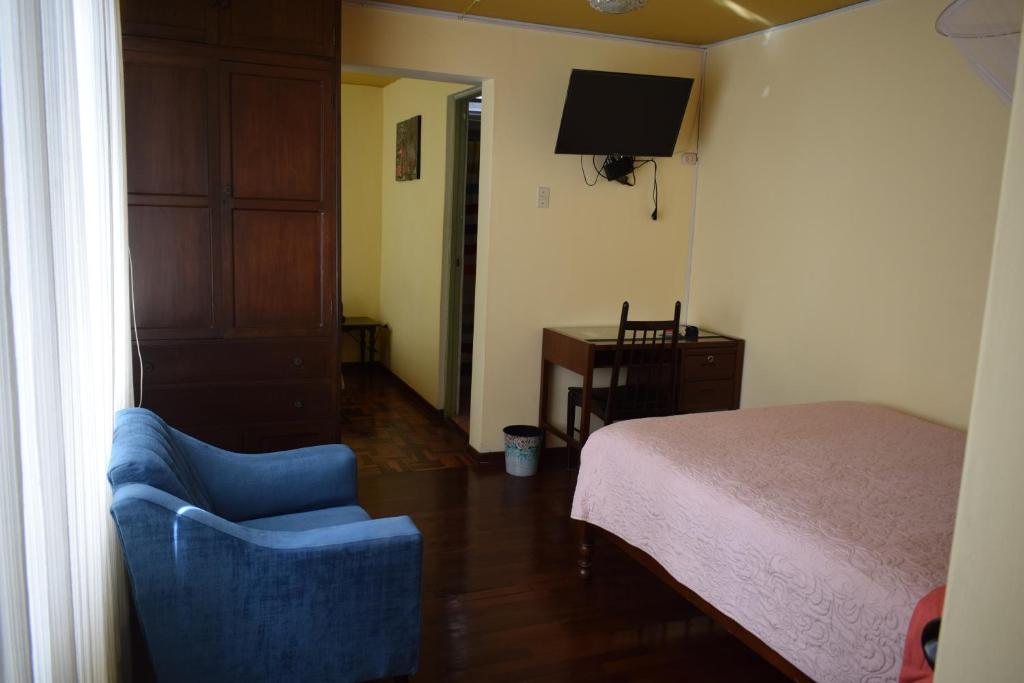 Postel nebo postele na pokoji v ubytování Hostal Donde Alberto