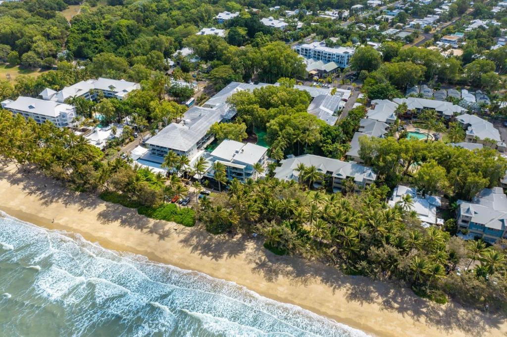 an aerial view of a resort on the beach at Belle Escapes Drift Beachfront Resort Pool View Suite 4106 in Palm Cove
