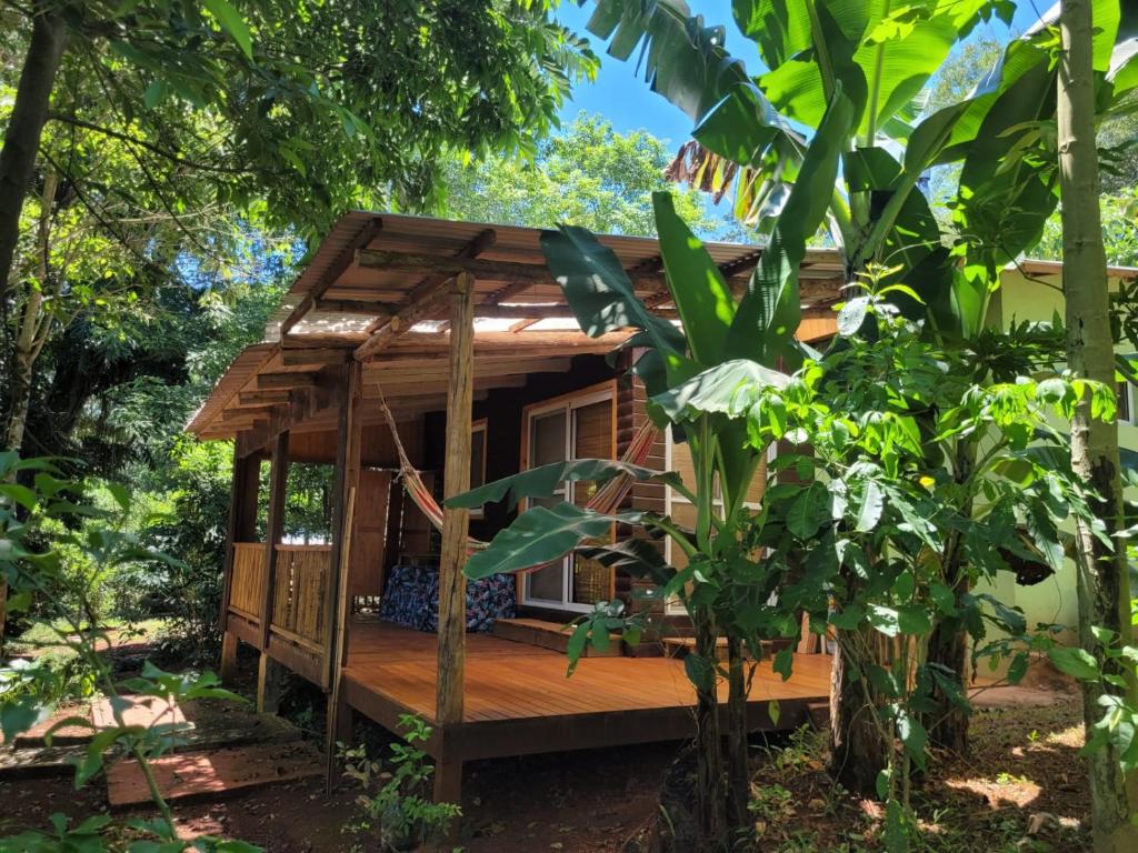 a tree house in the middle of a forest at Espacio Benignia in Puerto Libertad