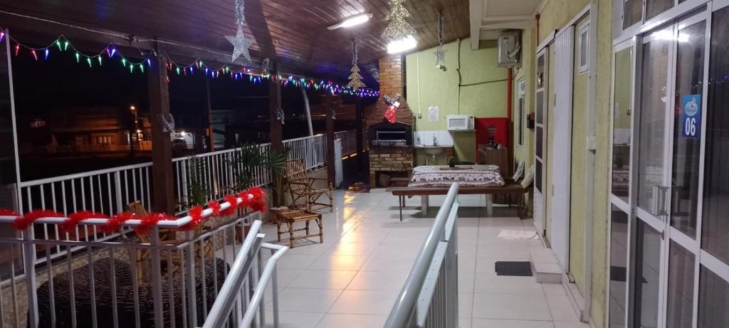 a hallway of a building with christmas lights on it at Pousada Oliveira in Florianópolis