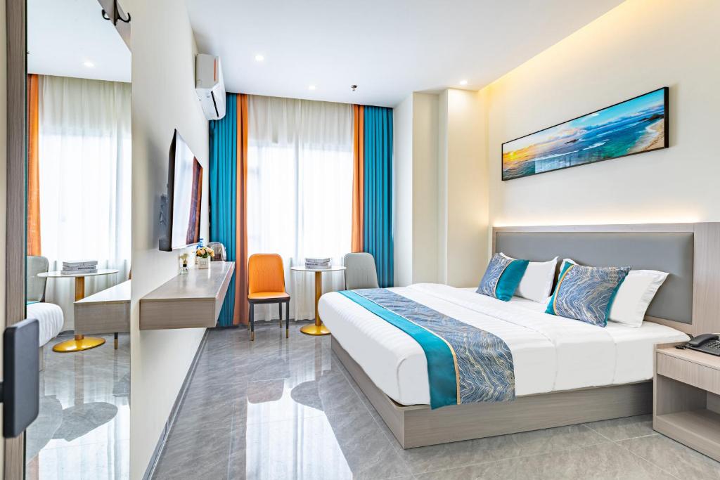 Postel nebo postele na pokoji v ubytování Zhuhai Golden Lake Bay Hotel