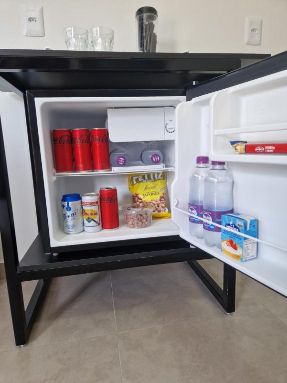 Kuchyň nebo kuchyňský kout v ubytování Condomínio Inn Studio