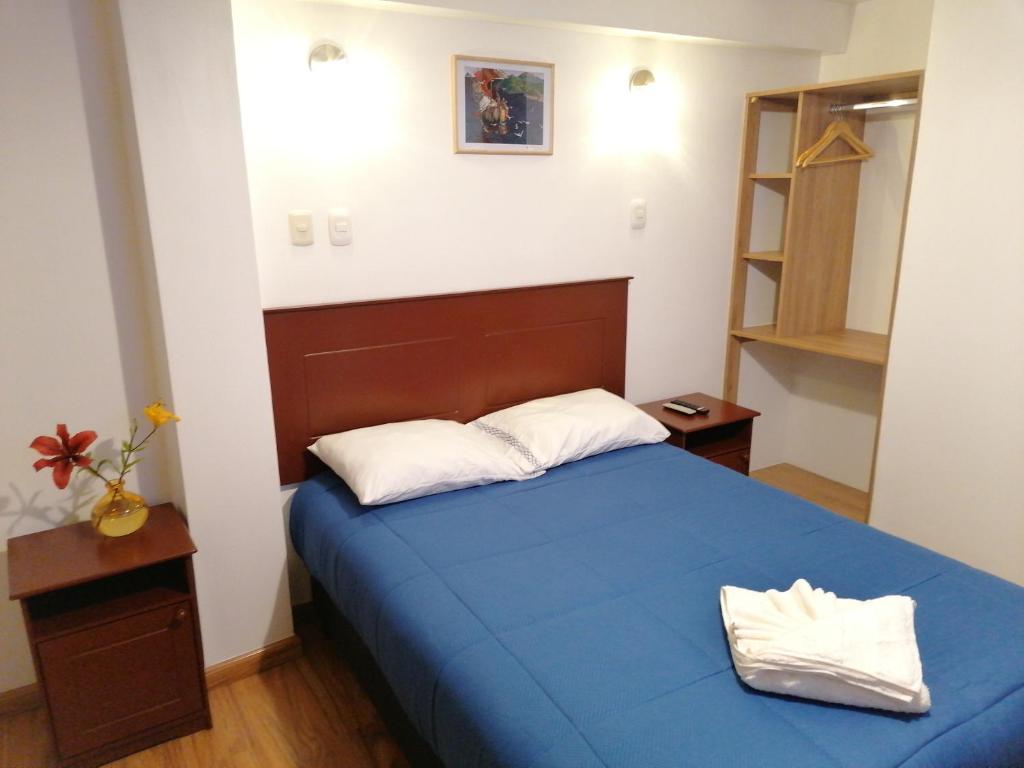 Postel nebo postele na pokoji v ubytování El Ave Azul Boutique Hotel Cusco