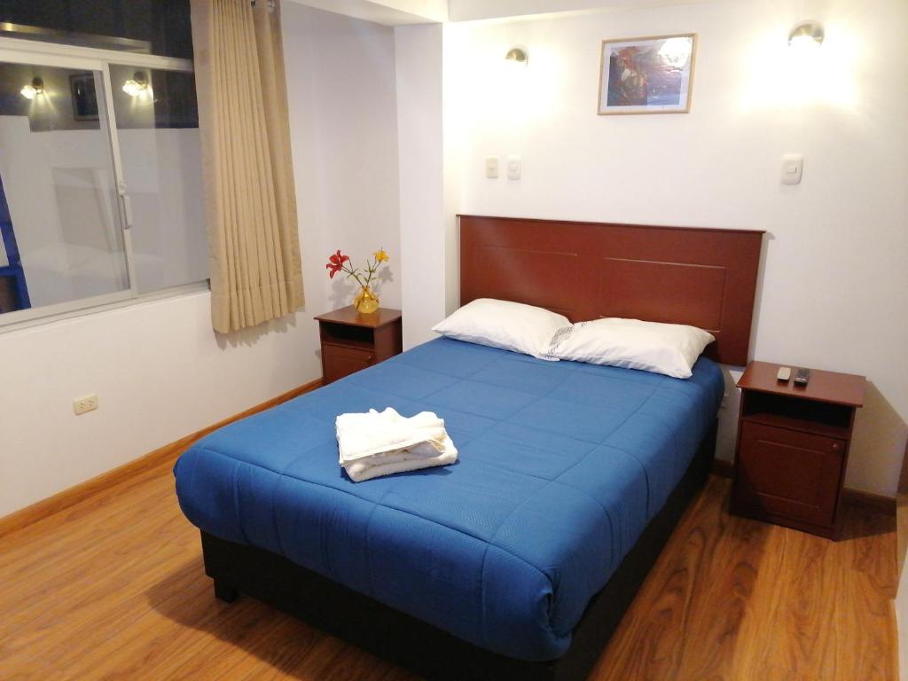 Postel nebo postele na pokoji v ubytování El Ave Azul Boutique Hotel Cusco