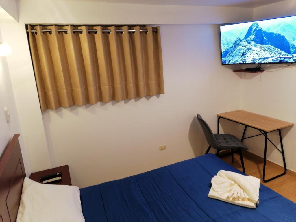 Postel nebo postele na pokoji v ubytování El Ave Azul Boutique Hotel Cusco