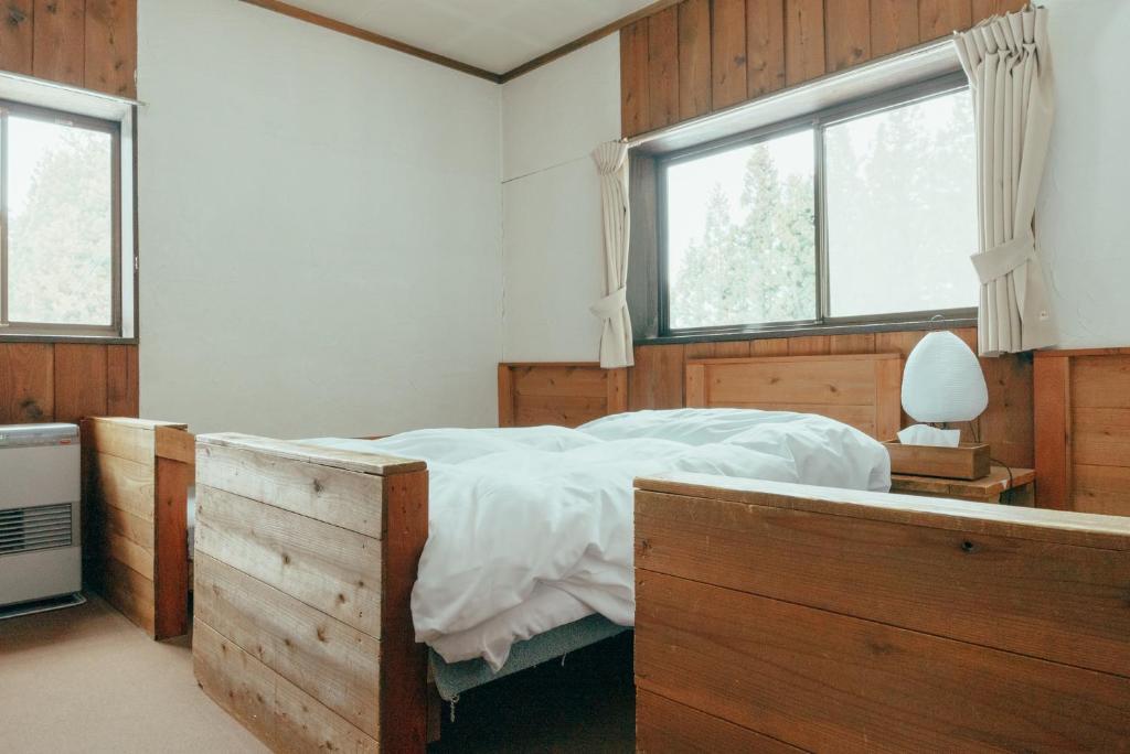 Postel nebo postele na pokoji v ubytování Pension FOLKLORE