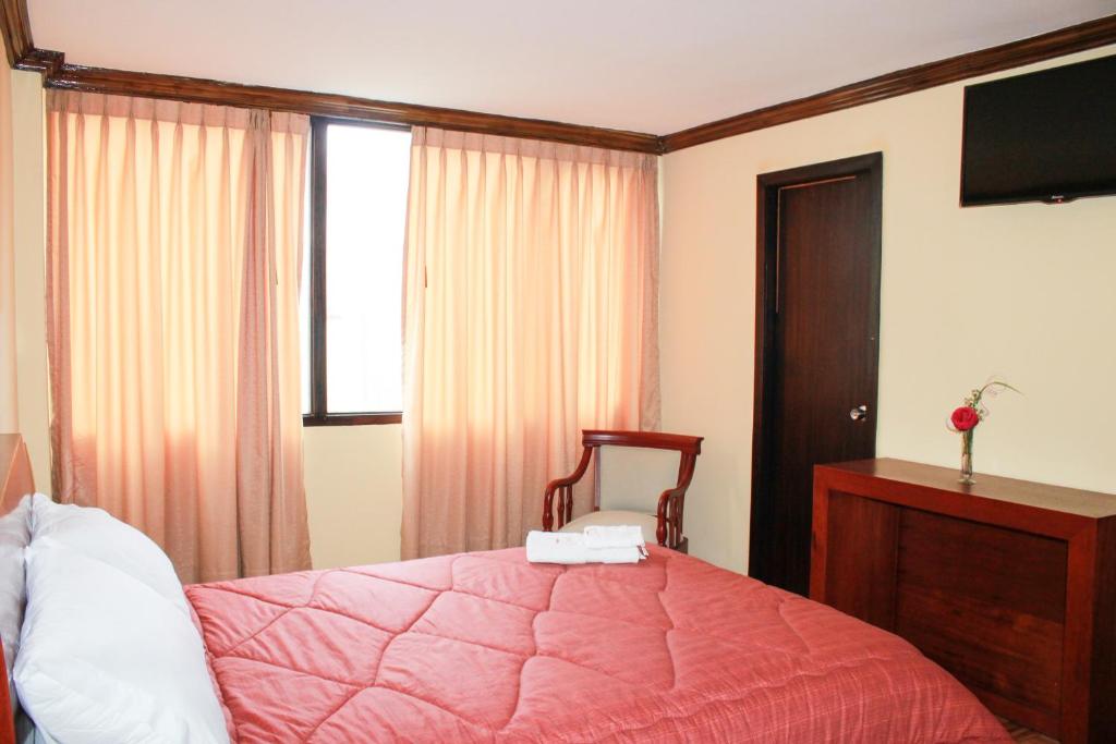 Postel nebo postele na pokoji v ubytování Hotel Villa Lafayette