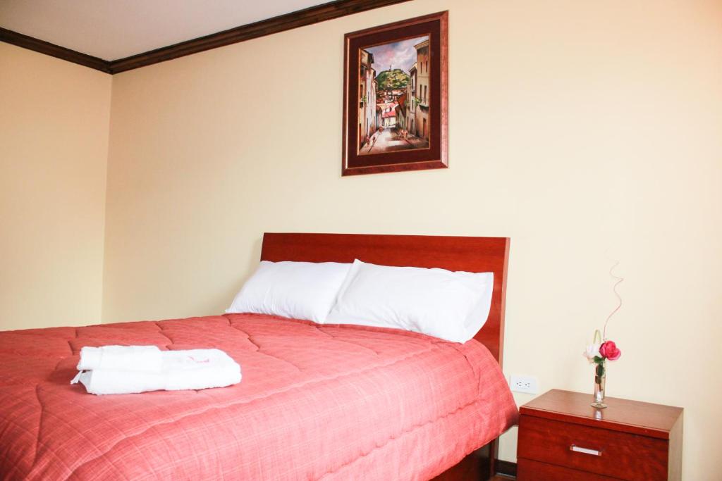 Postel nebo postele na pokoji v ubytování Hotel Villa Lafayette