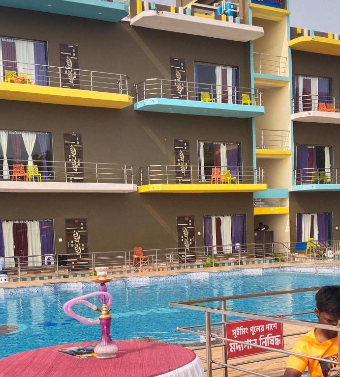 Bazén v ubytování ST Apple Beach Resort Mandarmani nebo v jeho okolí