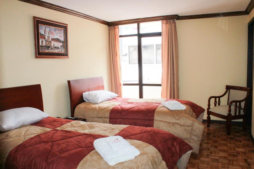 Postel nebo postele na pokoji v ubytování Hotel Villa Lafayette