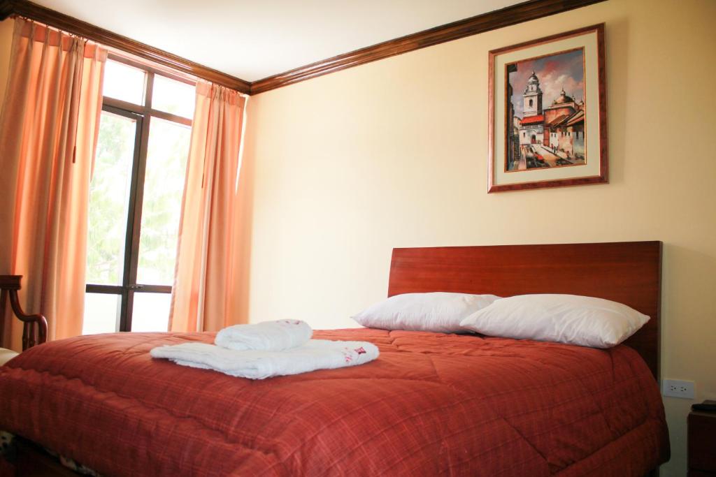 Postel nebo postele na pokoji v ubytování Hotel Villa Lafayette