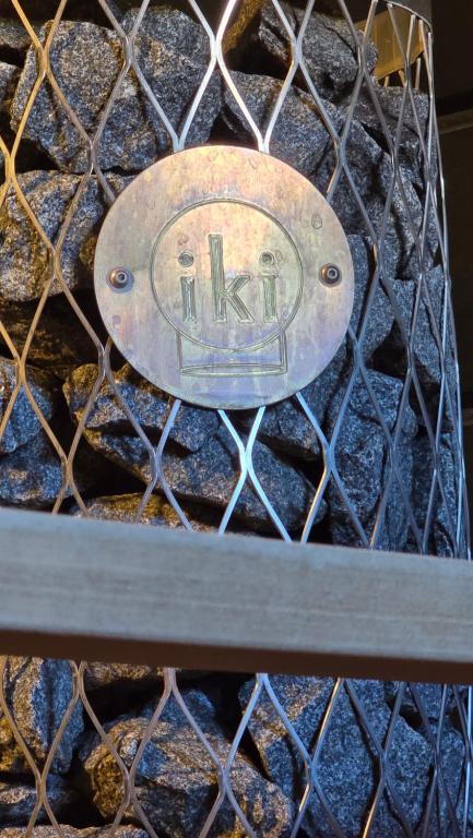 a metal plate with the word iraq on it at Pohjankatu (Vanha Rauma) in Rauma