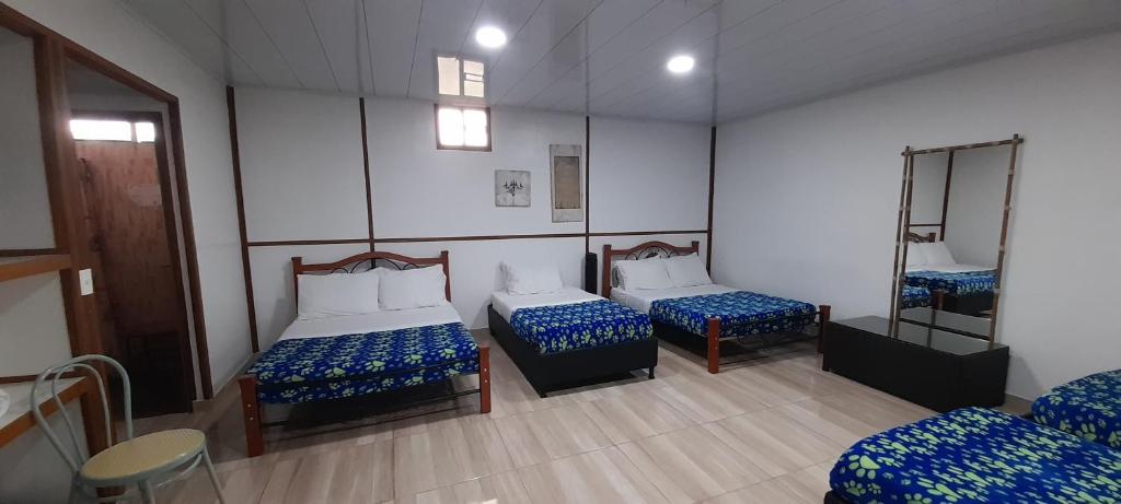 Postel nebo postele na pokoji v ubytování Finca Hotel Yerbabuena
