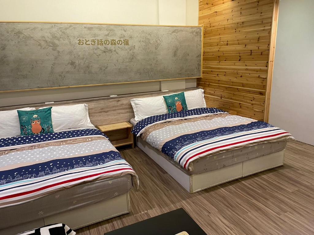 Postel nebo postele na pokoji v ubytování Star Moon Forest Inn