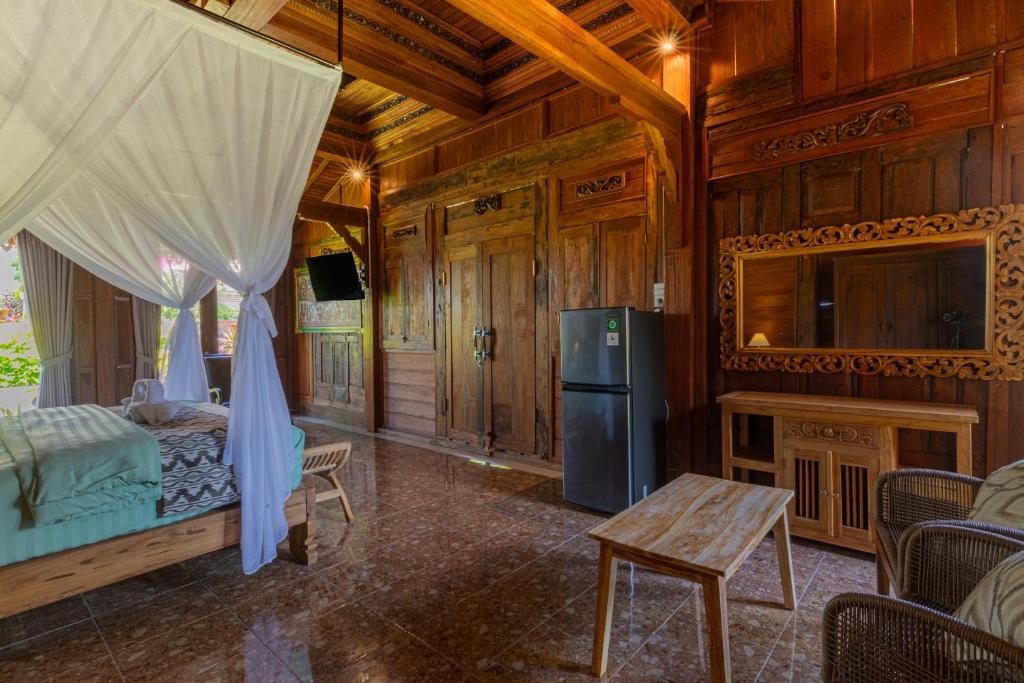 TV a/nebo společenská místnost v ubytování Billys Ayodya Villa