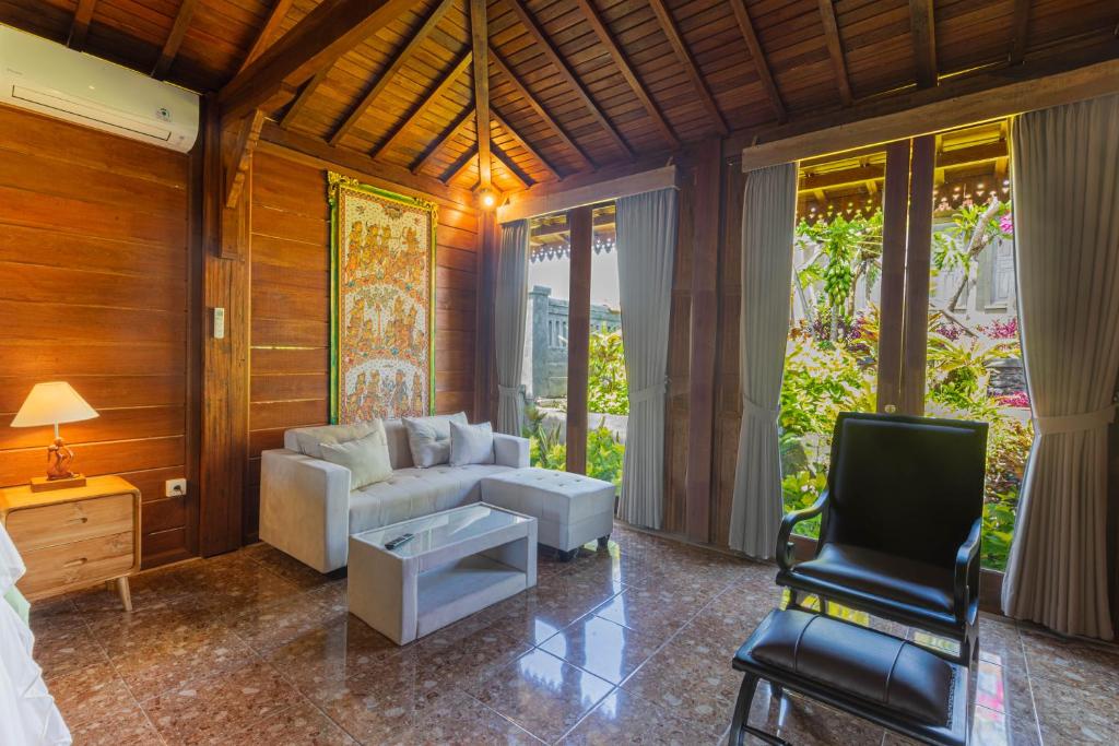 Posezení v ubytování Billys Ayodya Villa