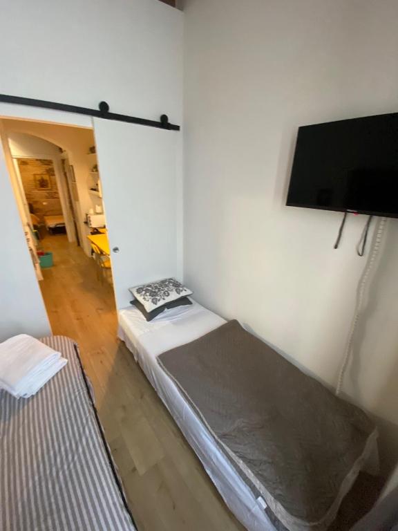 A television and/or entertainment centre at 30 San Gottardo House