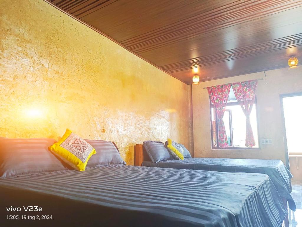 Postel nebo postele na pokoji v ubytování LÝ GIA HOMESTAY