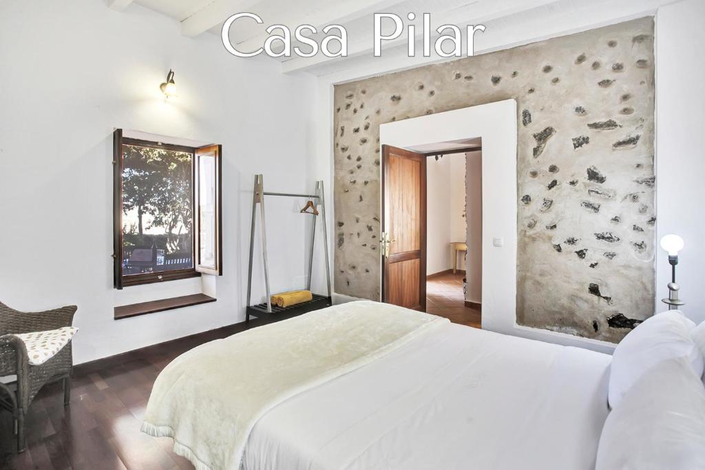 Postel nebo postele na pokoji v ubytování Casa Pilar, Aurora y Tarabilla en Finca Ecológica