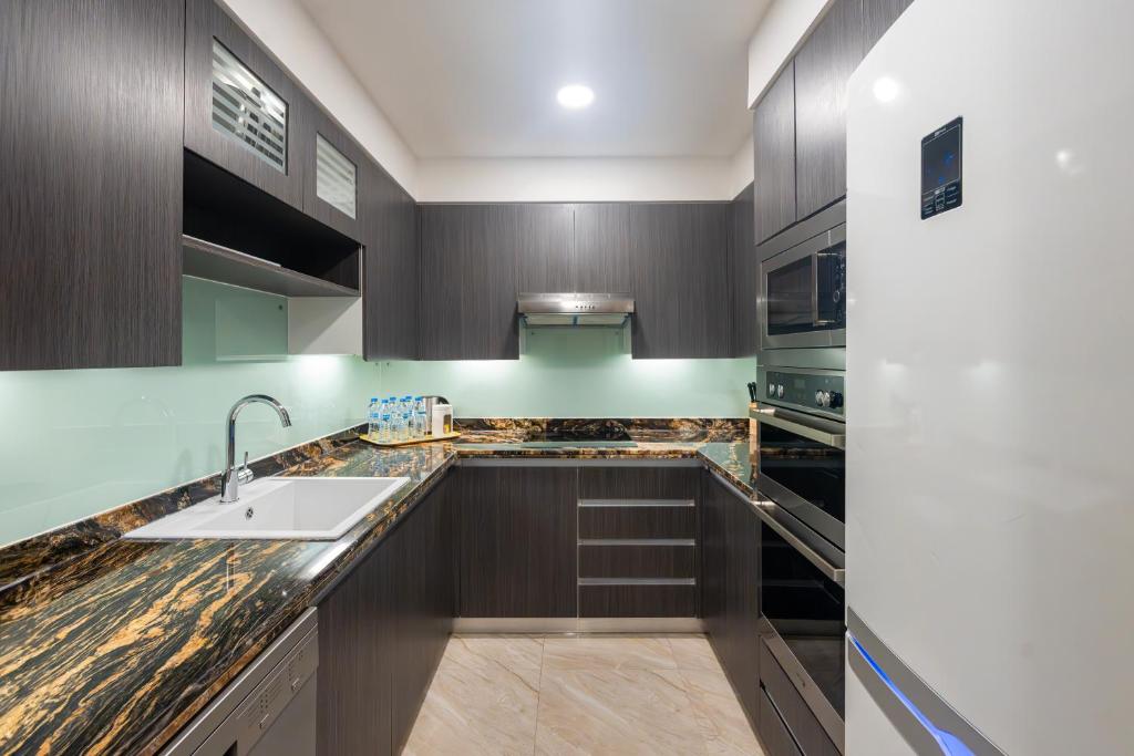 Kuchyň nebo kuchyňský kout v ubytování Hyatt Regency Galleria Residence Dubai