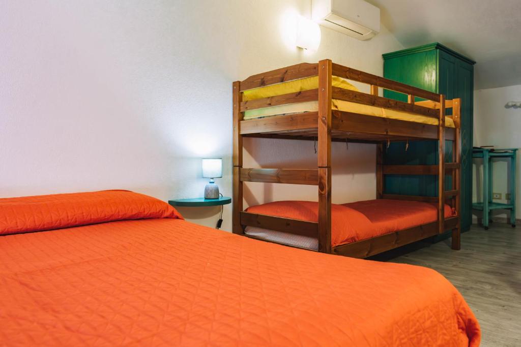 Łóżko lub łóżka w pokoju w obiekcie Oasi del Relax