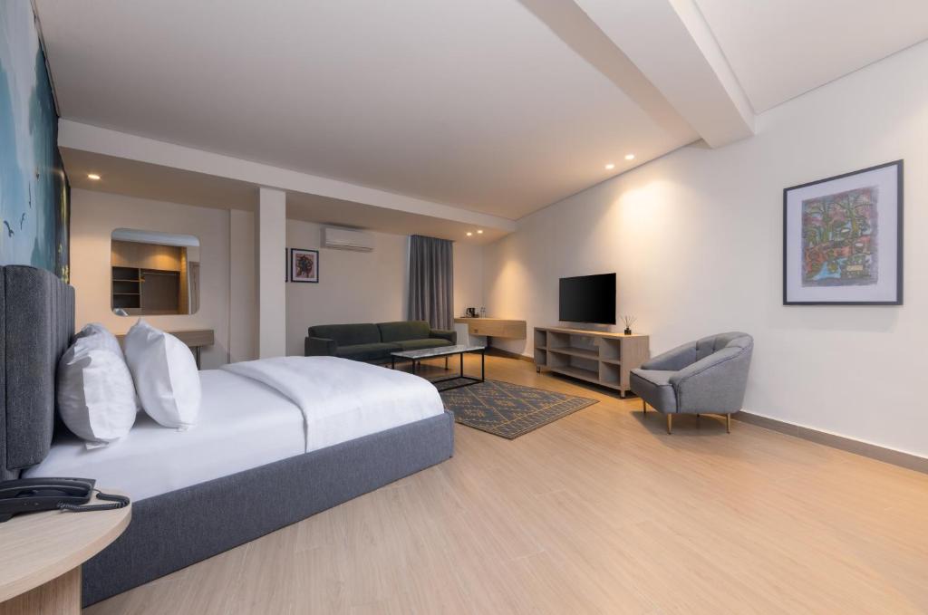 TV o dispositivi per l'intrattenimento presso Tree House Boutique Hotel