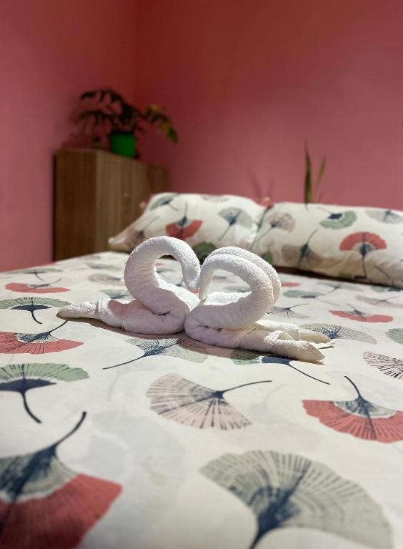 Postel nebo postele na pokoji v ubytování Rozay Travellers Inn