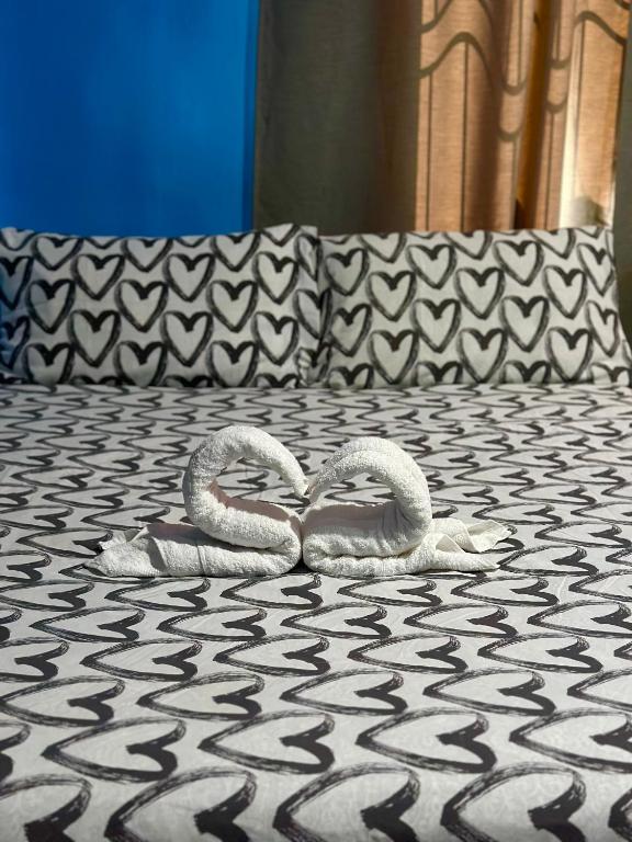 Postel nebo postele na pokoji v ubytování Rozay Travellers Inn