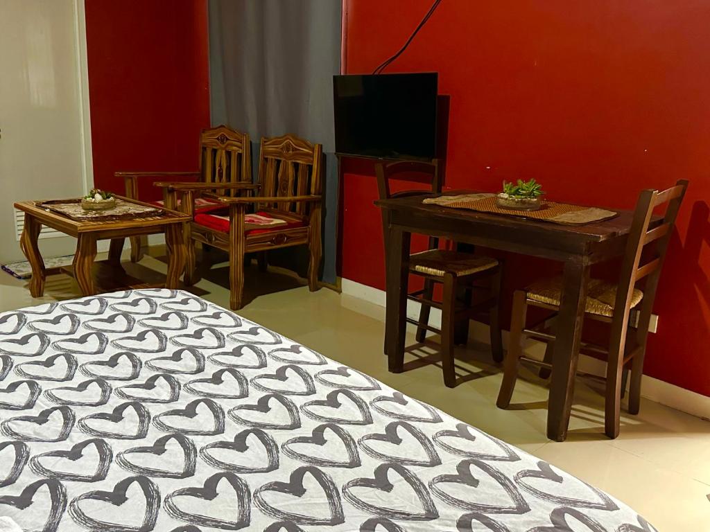 TV a/nebo společenská místnost v ubytování Rozay Travellers Inn