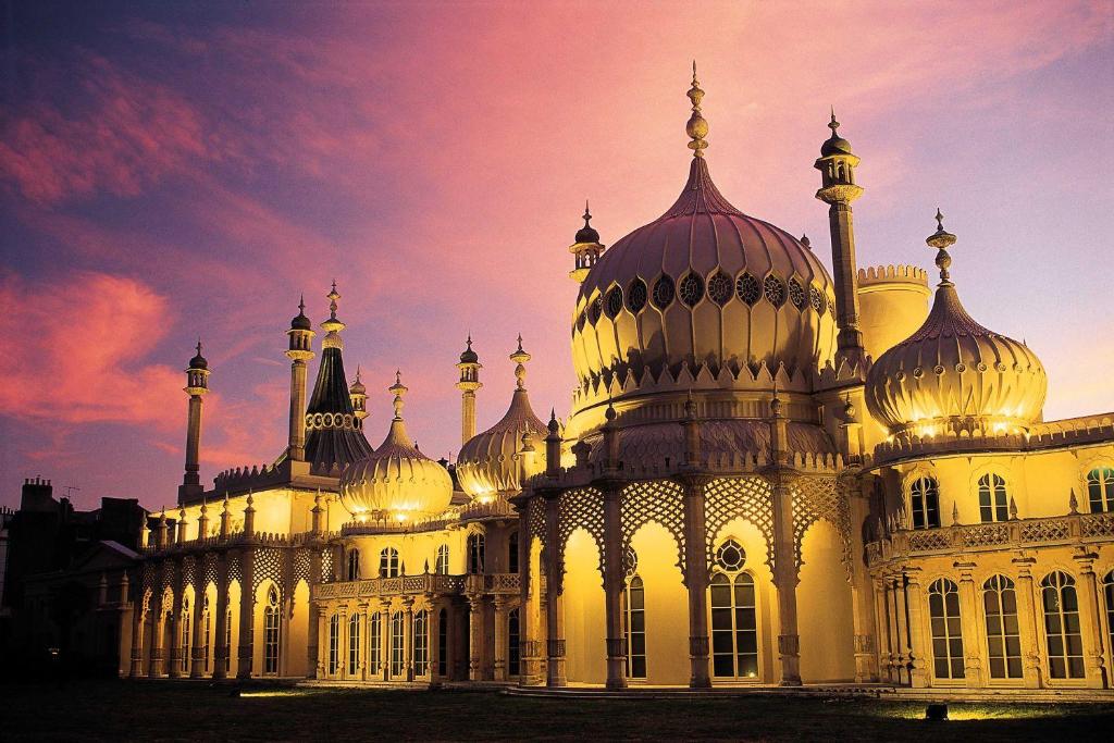 a large building with domes on top of it at Maldron Hotel Brighton City Centre in Brighton & Hove