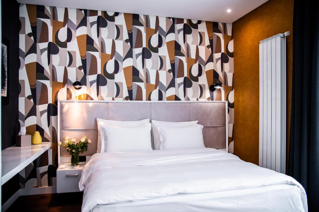Letto o letti in una camera di CRYSTAL Hotel Belgrade