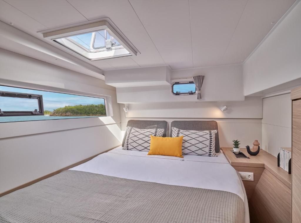 Un pat sau paturi într-o cameră la Catalina
