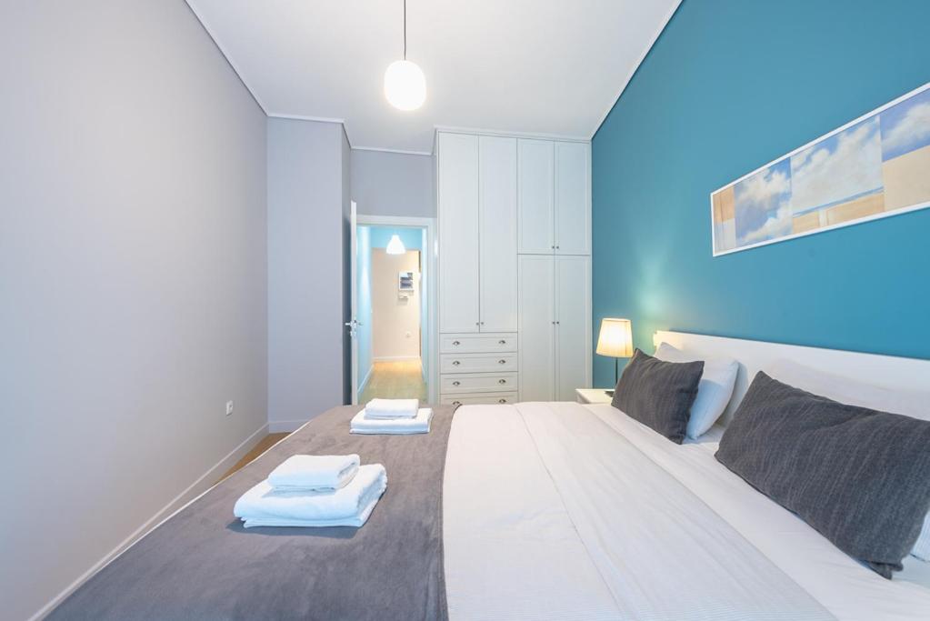 Postel nebo postele na pokoji v ubytování Pame Rentals - 2BD & 2BA Home, 4 Min to Acropolis