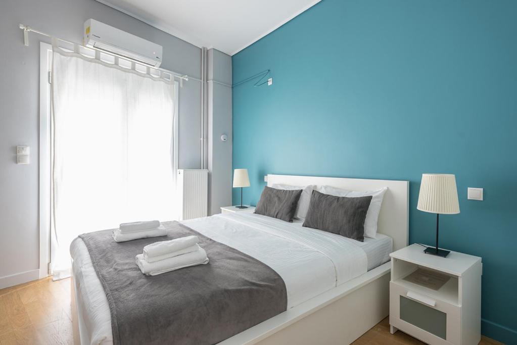 Postel nebo postele na pokoji v ubytování Pame Rentals - 2BD & 2BA Home, 4 Min to Acropolis