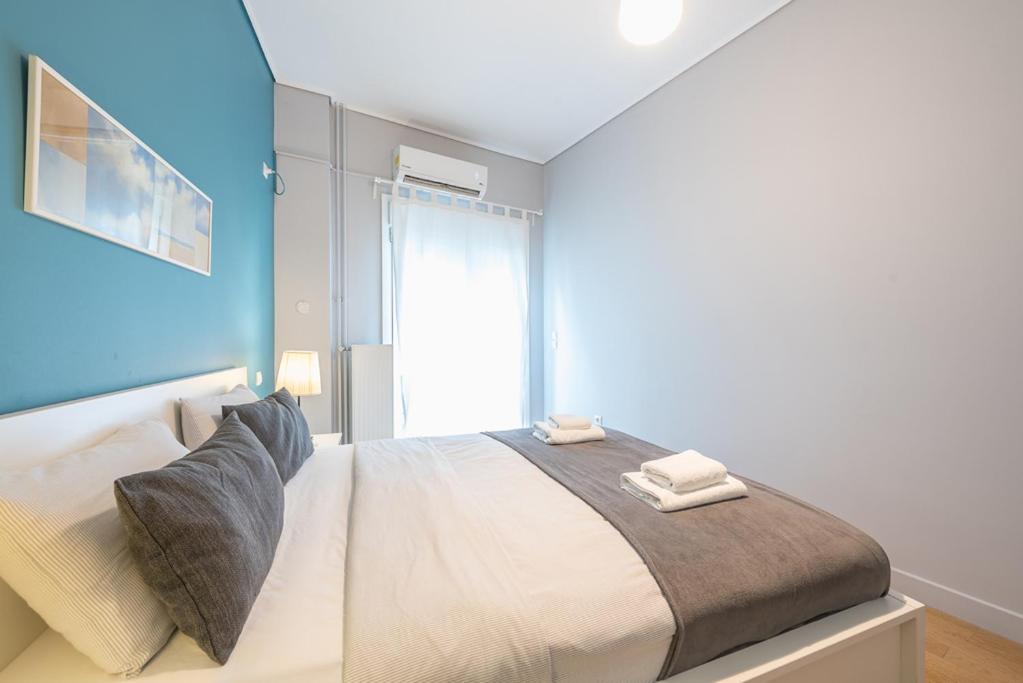 Postel nebo postele na pokoji v ubytování Pame Rentals - 2BD & 2BA Home, 4 Min to Acropolis