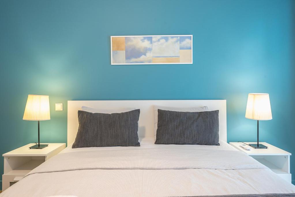Postel nebo postele na pokoji v ubytování Pame Rentals - 2BD & 2BA Home, 4 Min to Acropolis