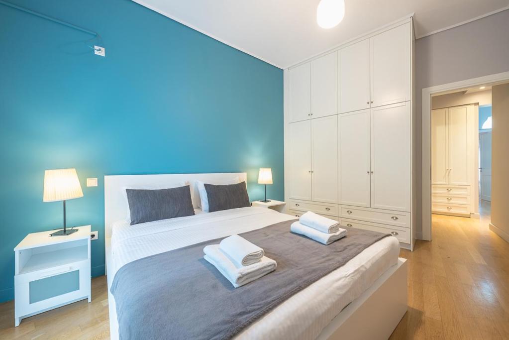Postel nebo postele na pokoji v ubytování Pame Rentals - 2BD & 2BA Home, 4 Min to Acropolis