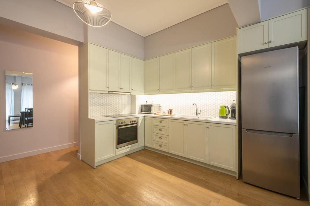 Kuchyň nebo kuchyňský kout v ubytování Pame Rentals - 2BD & 2BA Home, 4 Min to Acropolis