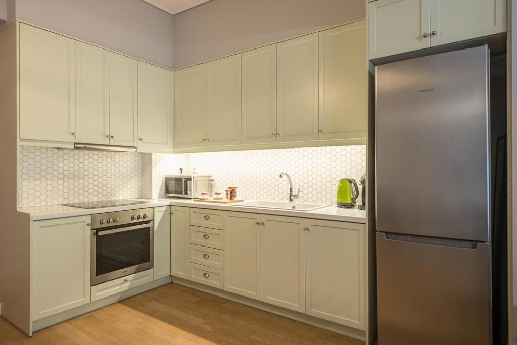 Kuchyň nebo kuchyňský kout v ubytování Pame Rentals - 2BD & 2BA Home, 4 Min to Acropolis