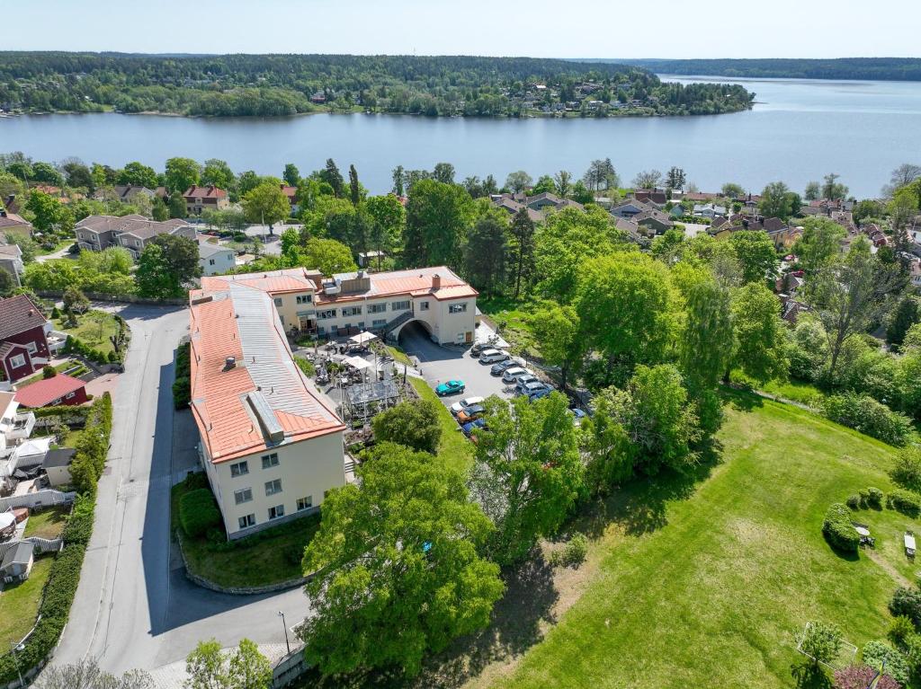 an aerial view of a town with a lake at Hotell Kristina in Sigtuna