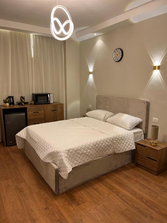 Postel nebo postele na pokoji v ubytování Cozy Royal Rooms in new cairo