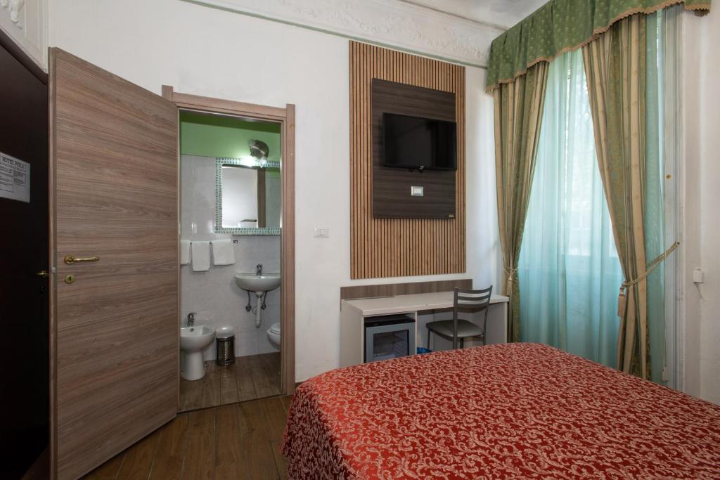 Koupelna v ubytování Hotel Piola