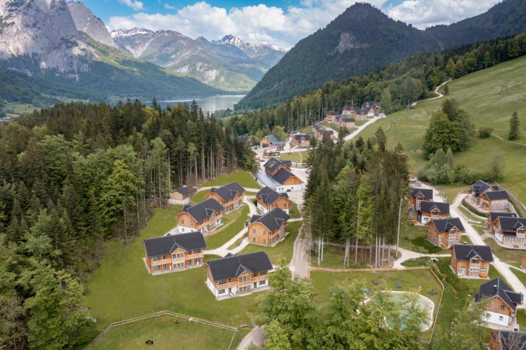 an aerial view of a village in the mountains at Narzissendorf Zloam in Grundlsee