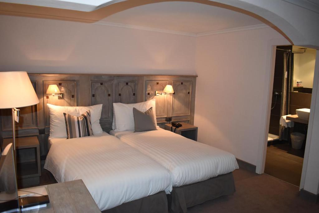 Postel nebo postele na pokoji v ubytování Hotel Central, SPA & LOUNGE BAR